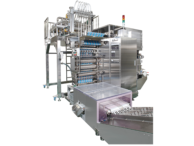 Four-sided seal filling and packaging machine for liquid and paste